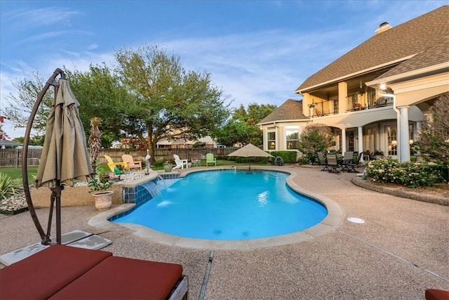 view of swimming pool with a fenced in pool, a patio area, and a fenced backyard