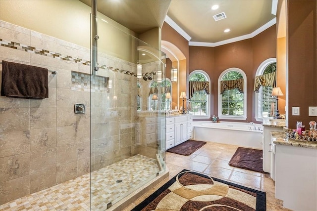 full bath with a garden tub, visible vents, vanity, ornamental molding, and walk in shower