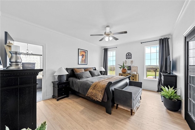 bedroom featuring ceiling fan with notable chandelier, light hardwood / wood-style floors, and ornamental molding