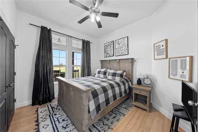 bedroom featuring ceiling fan and light wood-type flooring