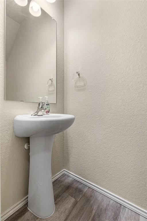 bathroom featuring hardwood / wood-style flooring