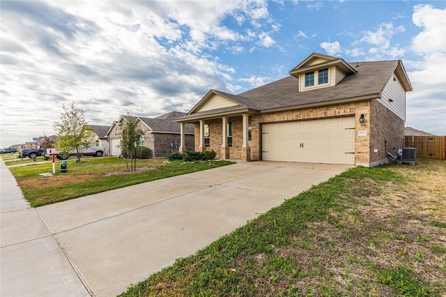 craftsman-style home featuring a front yard and cooling unit