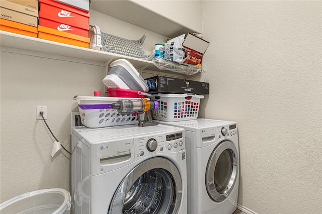 washroom featuring washer and dryer