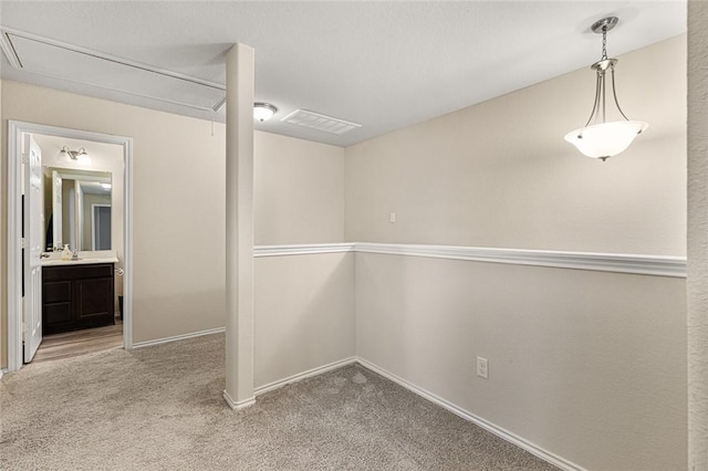 carpeted empty room with sink