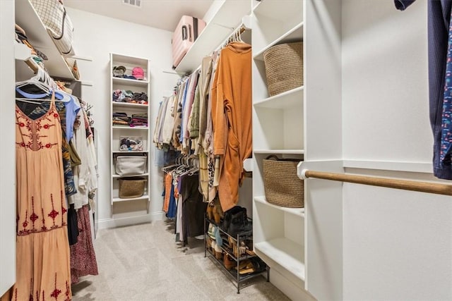 spacious closet featuring carpet floors and visible vents