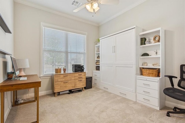 home office with visible vents, ornamental molding, light carpet, ceiling fan, and baseboards