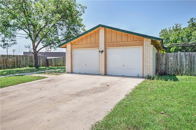 garage with a yard