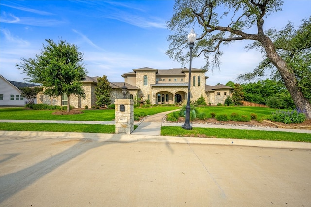 view of front of home with a front lawn