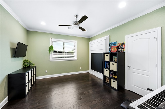 interior space with ornamental molding, ceiling fan, and dark wood-type flooring