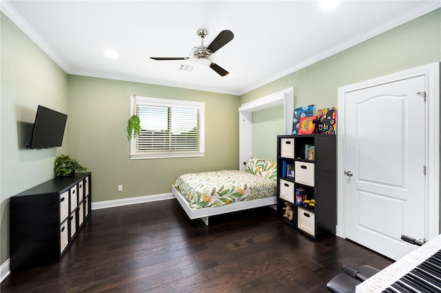 bedroom featuring ceiling fan, crown molding, and dark wood-type flooring