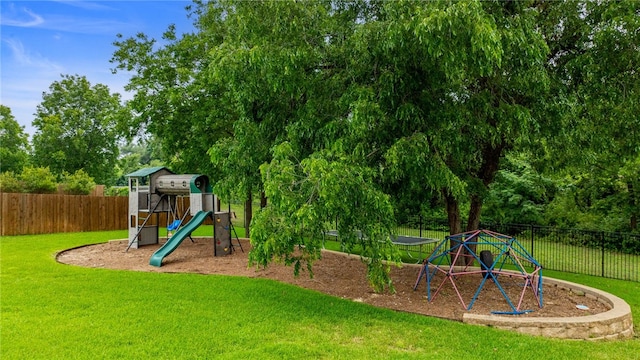 view of playground featuring a lawn