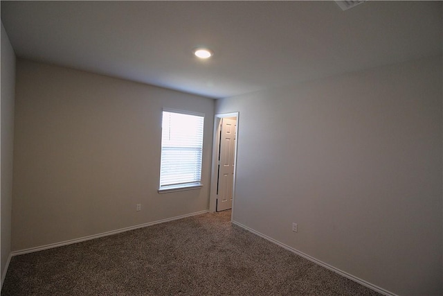 view of carpeted spare room