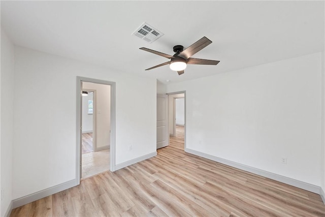 unfurnished bedroom with light hardwood / wood-style floors and ceiling fan