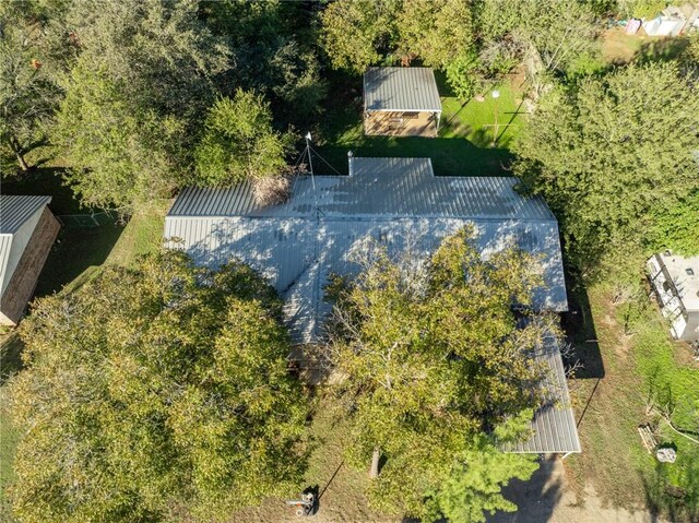 surrounding community with a lawn and a trampoline