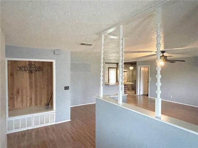 entrance foyer with a textured ceiling and light wood-type flooring