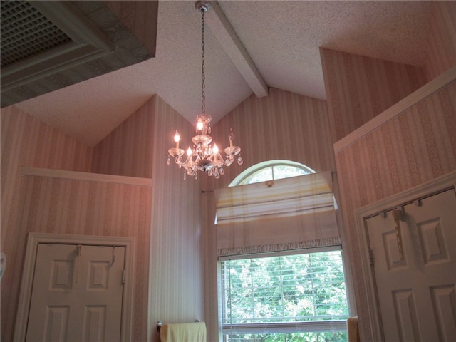 details with beam ceiling, a notable chandelier, and wood walls