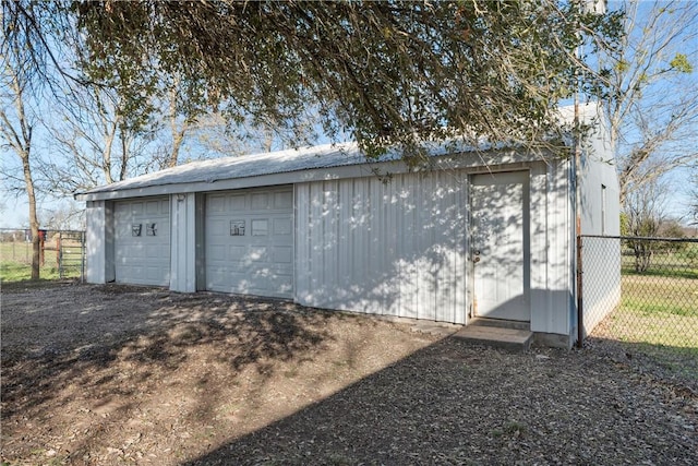 detached garage with fence