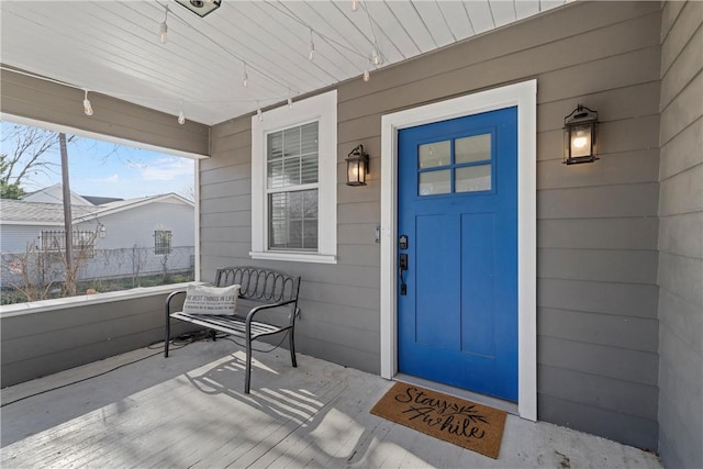 doorway to property with a porch