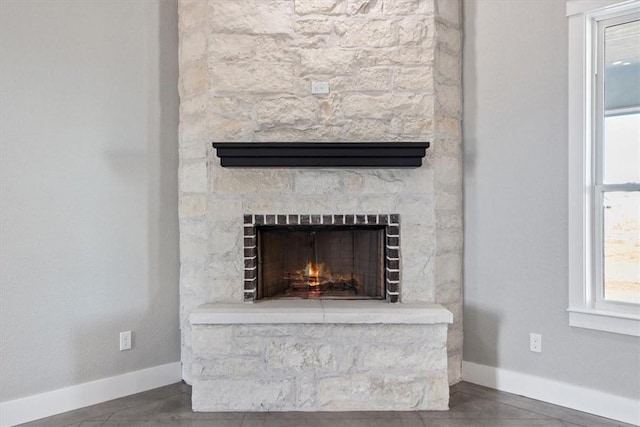 interior details featuring a fireplace