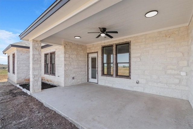 view of patio / terrace featuring ceiling fan