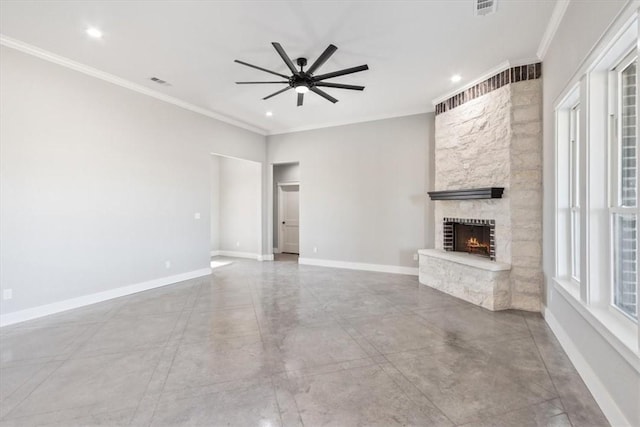 unfurnished living room with a fireplace, ceiling fan, and crown molding