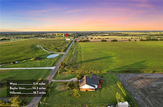 aerial view at dusk with a rural view