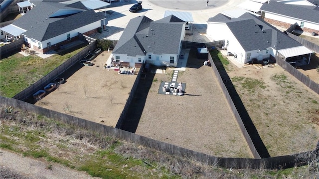 birds eye view of property with a residential view