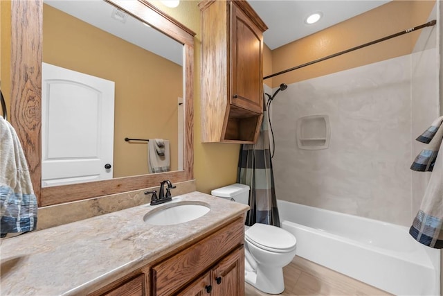 full bathroom with tile patterned floors, shower / tub combo with curtain, vanity, and toilet