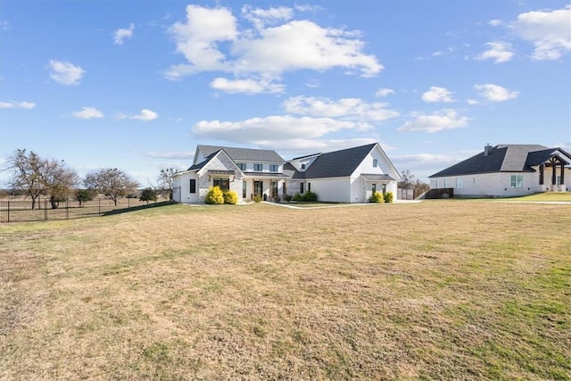 view of front of house with a front lawn