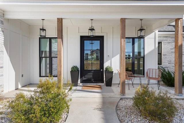 doorway to property featuring a porch