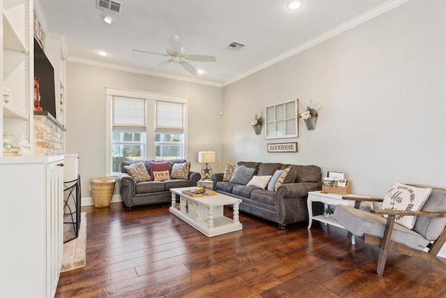 living room featuring dark hardwood / wood-style floors, ceiling fan, and crown molding