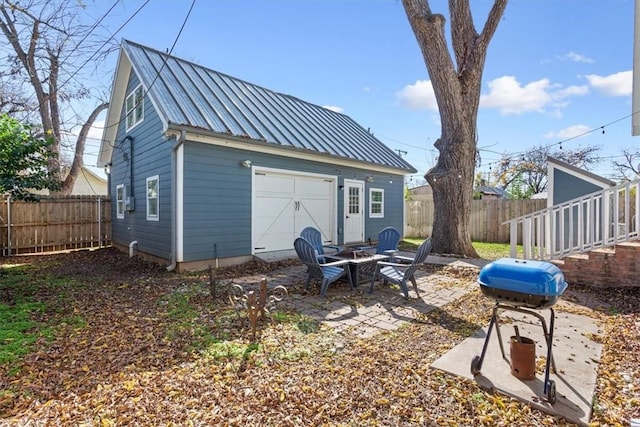 exterior space with an outdoor fire pit