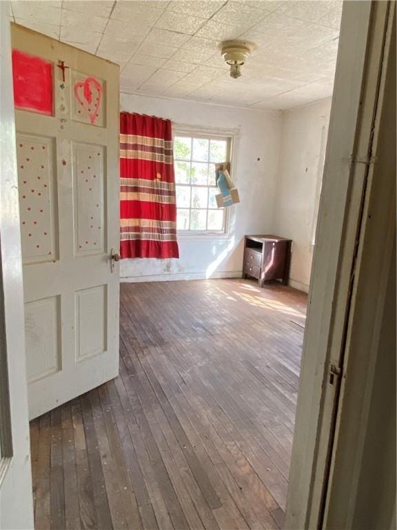 unfurnished room featuring hardwood / wood-style floors