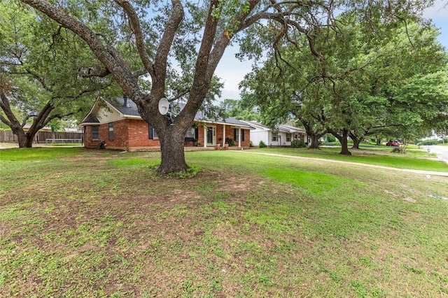 view of front of home with a front lawn