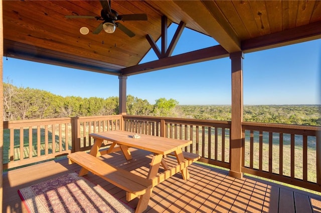 wooden deck with ceiling fan