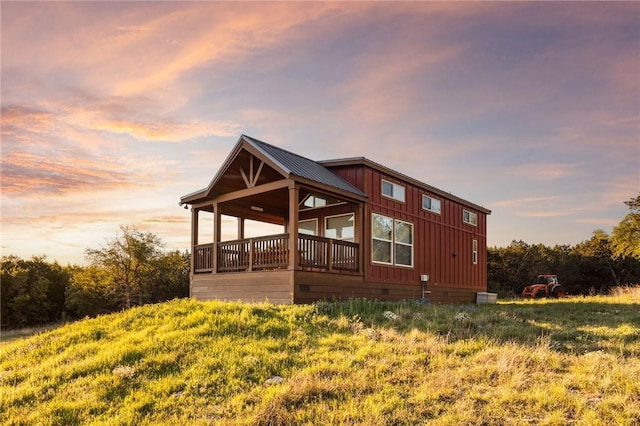 view of property exterior at dusk