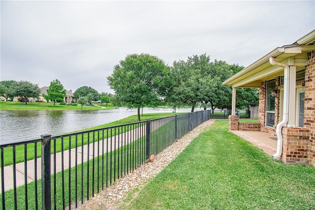 view of yard with a water view