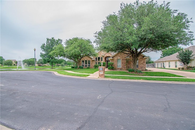 ranch-style house with a front yard