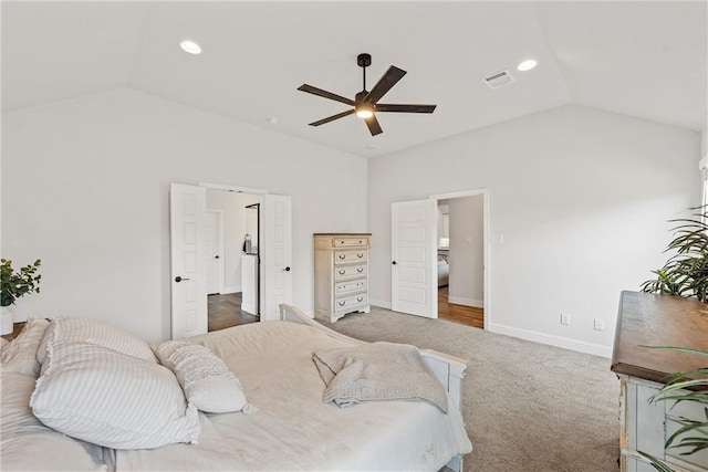 bedroom with lofted ceiling, recessed lighting, visible vents, and baseboards