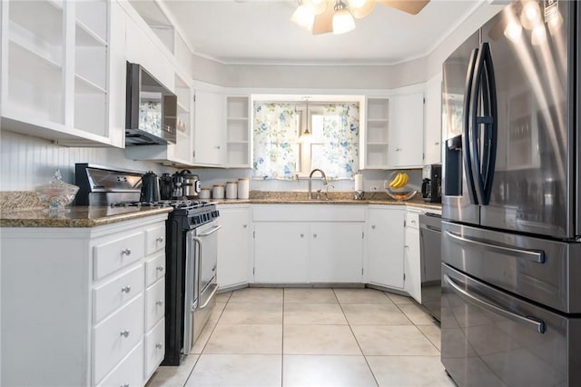 kitchen featuring light tile patterned floors, open shelves, appliances with stainless steel finishes, and white cabinets