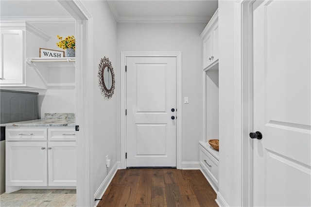 mudroom featuring baseboards, ornamental molding, and dark wood-style flooring