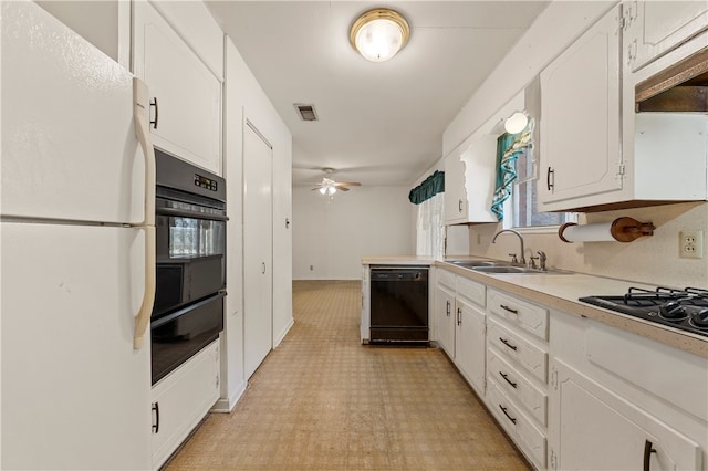 kitchen featuring white cabinetry, sink, ceiling fan, range hood, and black appliances