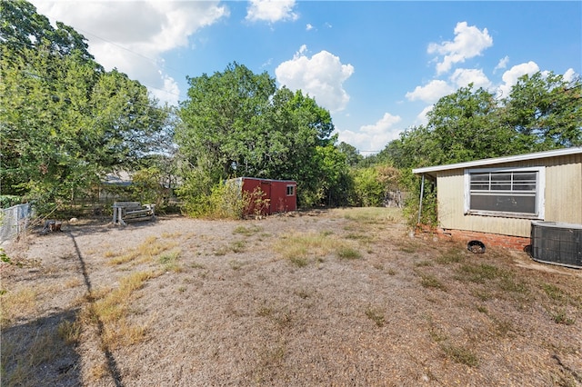 view of yard with central AC unit