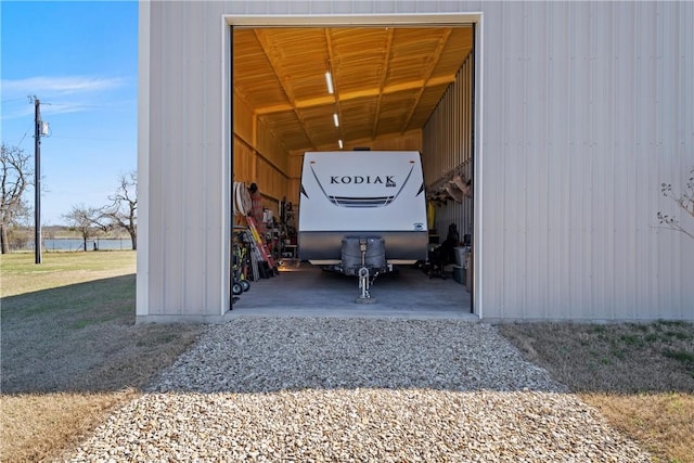 garage featuring a carport