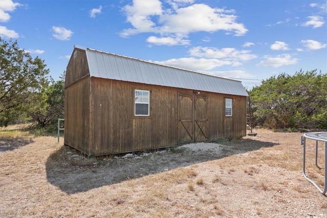 view of outbuilding featuring a trampoline