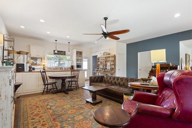 living room with ceiling fan