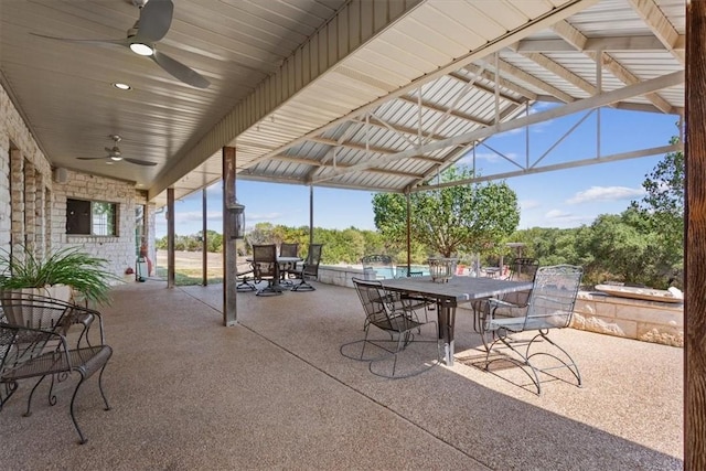 view of patio featuring ceiling fan