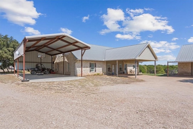 view of car parking featuring a carport