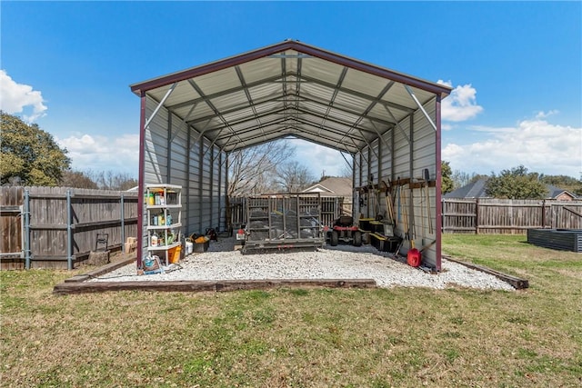 exterior space with a carport and fence