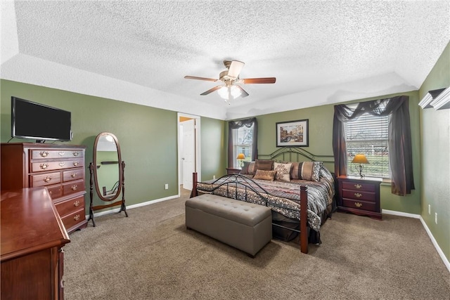 bedroom with baseboards, multiple windows, and carpet